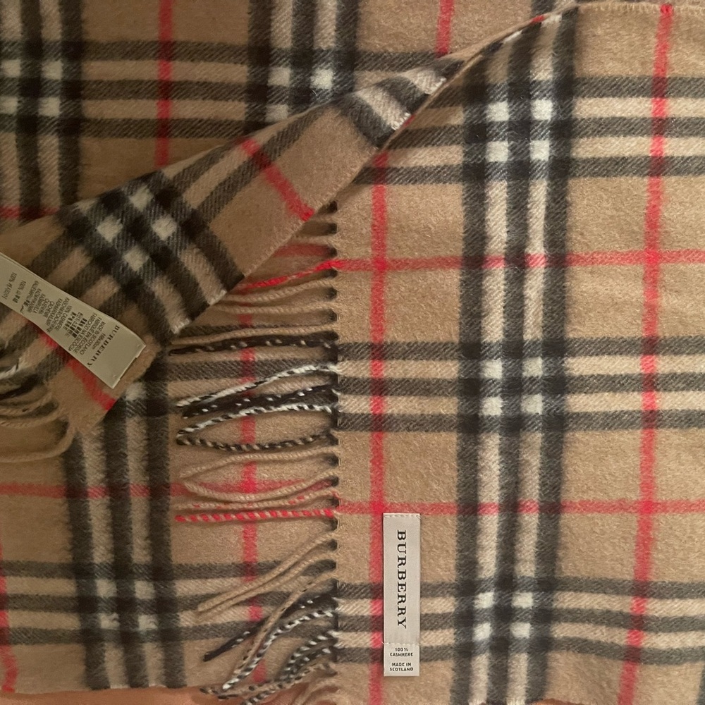 Burberry- Luxe cashmere scarf in Burberry's archival plaid.